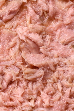 Delicious sandwiches consisting of grilled toast, canned tuna and cream cheese on a dark concrete...