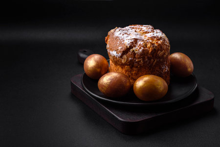 Delicious fresh Easter cake with fruits and raisins on a dark concrete background