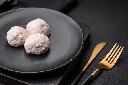 Delicious healthy steamed chicken cutlets or minced meatballs. diet food dishの写真素材