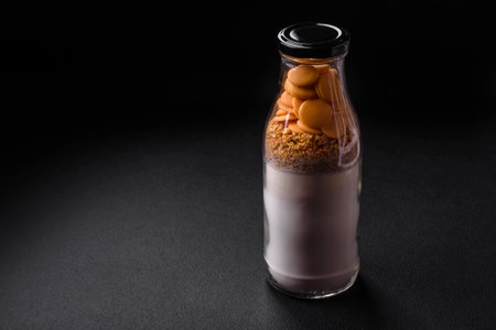 Ingredients for making delicious sweet pancakes that are portioned in a bottle. Recipe for home...