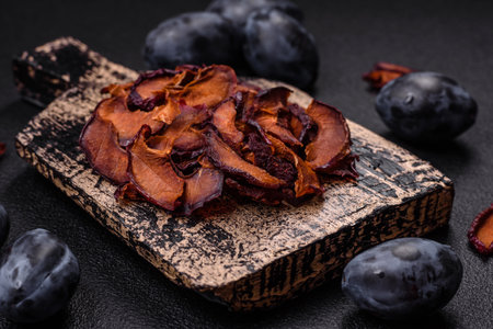 Fresh sweet blue plum sliced and dried for use as an ingredient for making sweetsの写真素材