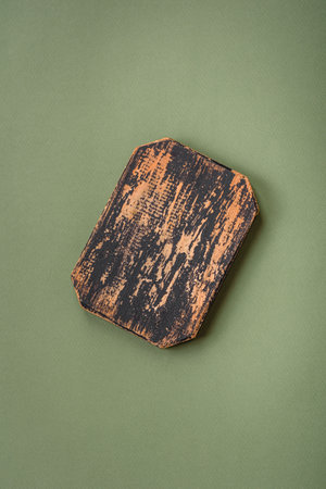 Empty wooden rectangular cutting board on a plain background, flatley with copy space. Kitchen...