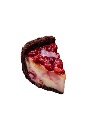 Delicious sweet cheesecake cake with mascarpone cheese, cherry berries and jam on a dark concrete...