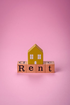 Small wooden house and the description for rent. Concept for sale, rental of real estate for a family. Real estate agency, sale of new houses and apartmentsの写真素材