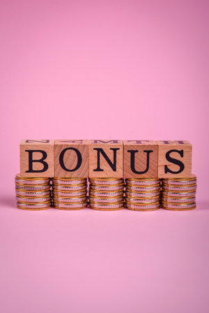 The inscription Tax made of wooden cubes on a plain background. Can be used for your designの写真素材