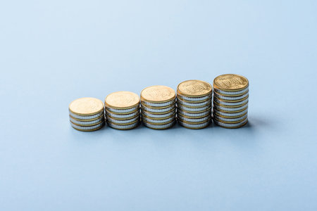The inscription Bonus made of wooden cubes on a plain background. Can be used for your designの写真素材