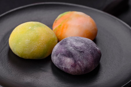 Delicious sweet chilled mochi desserts with fruit filling and rice dough coating