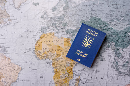 Conceptual background for travel with passport, magnifying glass, world map and money. Wallpaper for...