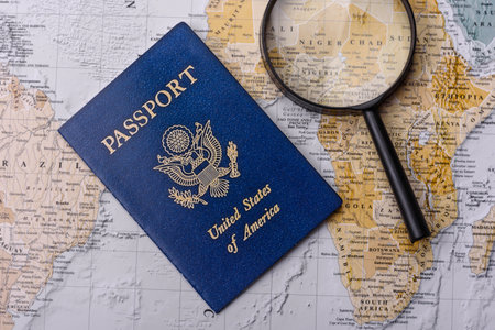 Conceptual background for travel with passport, magnifying glass, world map and money. Wallpaper for...