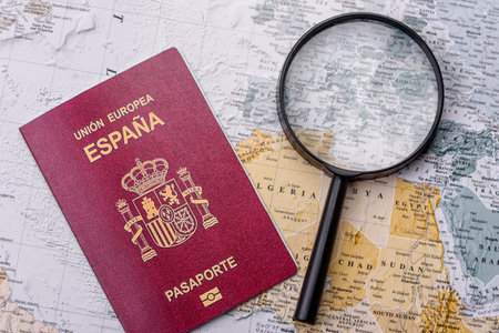 Conceptual background for travel with passport, magnifying glass, world map and money. Wallpaper for...