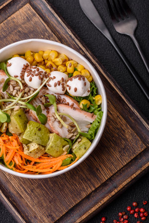 Delicious diet salad with turkey or chicken slices, lettuce, carrots, mozzarella, corn and zucchini. Diet foodの写真素材