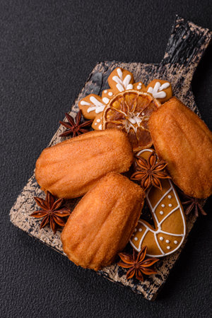 French classic madeleine sponge cake with elements of Christmas motifs. Preparing for the holidayの写真素材