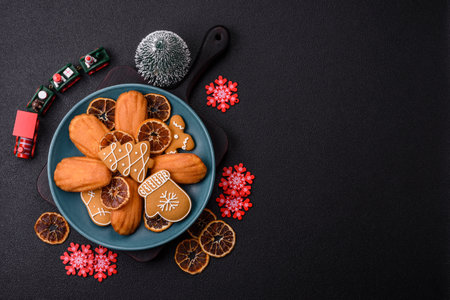 French classic madeleine sponge cake with elements of Christmas motifs. Preparing for the holidayの写真素材