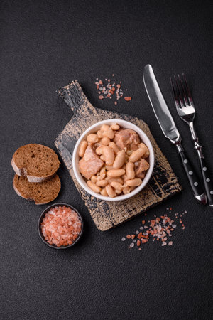 Cassoulet with white beans, meat and sausages, vegetables, salt and spices as a classic French foodの写真素材