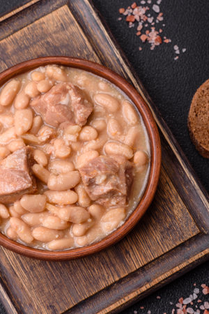Cassoulet with white beans, meat and sausages, vegetables, salt and spices as a classic French foodの写真素材