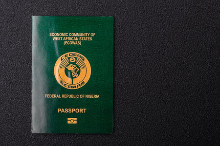 International passport of a citizen Nigeria on a dark concrete background, international travelの写真素材