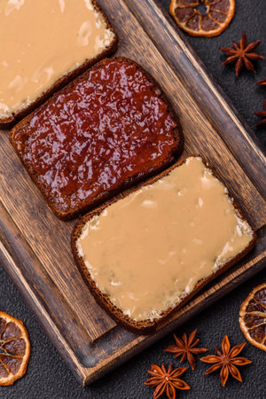 Sandwiches with toast bread, peanut butter and raspberry or strawberry jam. Hearty, nutritious...