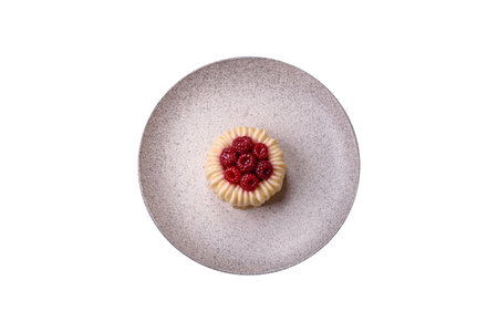 Sweet tart with raspberries on a white background