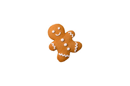 Homemade Christmas gingerbread cookies made as sweets and holiday table decorations