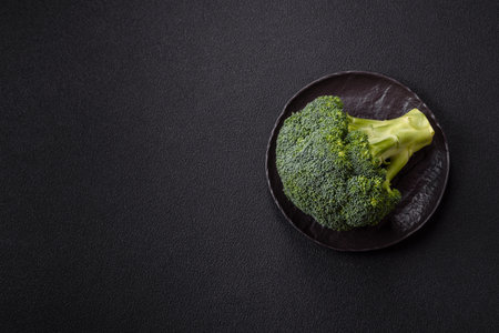 A sprig of raw green broccoli as an ingredient for a healthy vegetarian or vegan meal