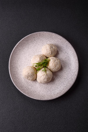 Delicious healthy steamed chicken cutlets or minced meatballs. diet food dishの写真素材