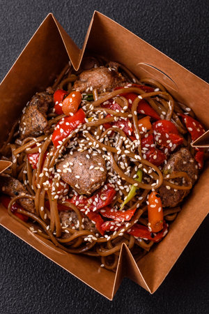Delicious spicy Asian food soba with buckwheat noodles, beef, vegetables, salt and spicesの写真素材