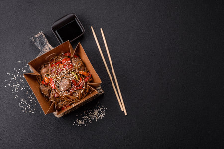 Delicious spicy Asian food soba with buckwheat noodles, beef, vegetables, salt and spicesの写真素材