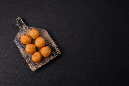 Crispy French fries with camembert or mozzarella cheese with cranberry or raspberry sauce