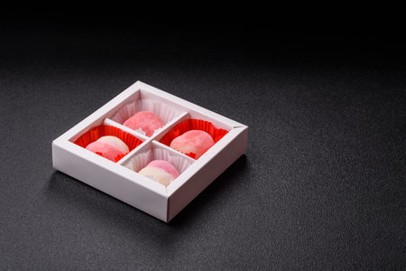 Delicious sweet mochi in the shape of red hearts for the holiday of Valentine's Dayの写真素材