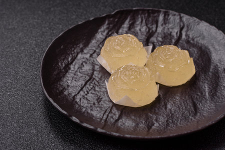 Jelly candies with different flavors on a dark backgroundの写真素材