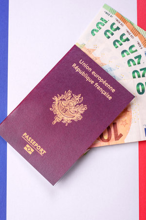 France citizen passport against the background of the France national flag as a background for your designの写真素材