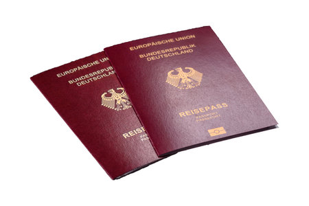 German citizen passport against the white background as a wallpaper for your designの写真素材