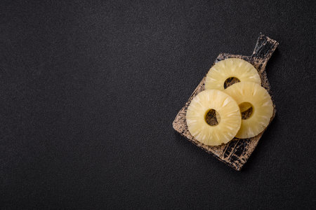 Tropical fruit pineapple in rings or slices sweet yellow colorの写真素材