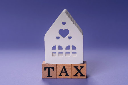 Tax on real estate, property, car or business. Mortgage finance payments, taxationの写真素材