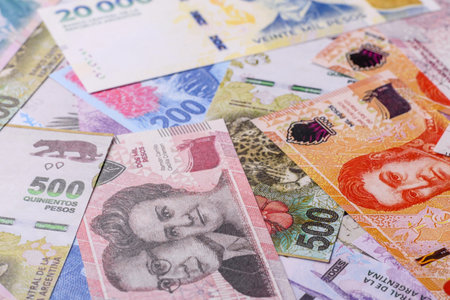 Background of Argentina peso paper money, notes with different denominations. Doing business, conceptual backgroundの写真素材