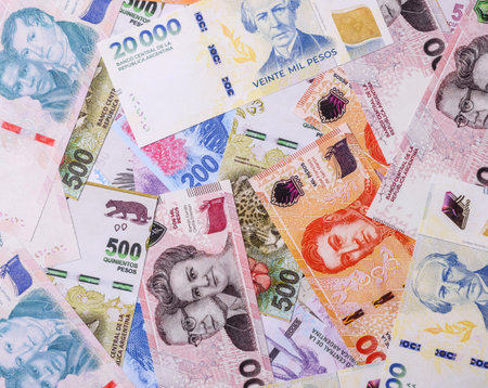 Background of Argentina peso paper money, notes with different denominations. Doing business, conceptual backgroundの写真素材