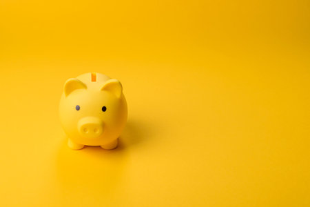 Piggy bank as a financial conceptual background with coins.の写真素材