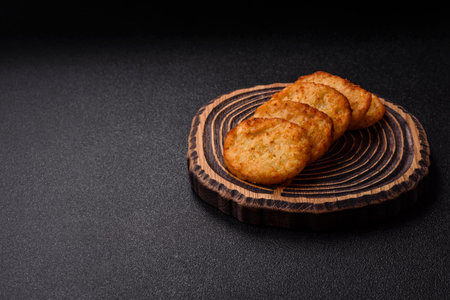 Potato hash browns, a meal with onions, cabbage in the form of fritters. Vegetable healthy breakfastの写真素材