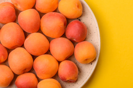 Fresh ripe fruit apricots are red yellow in color. Apricots as a background for your designの写真素材