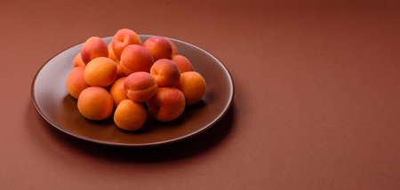 Fresh ripe fruit apricots are red yellow in color. Apricots as a background for your designの写真素材