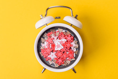 Christmas, gingerbread or biscuits on a plate on a vintage clock. Christmas time conceptual...