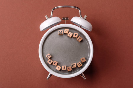 gingerbread or biscuits on a plate on a vintage clock. Christmas time conceptual background, festive...
