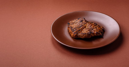 Meat, steak, beef tenderloin cooked on grill. Juicy steak as a food background for your designの写真素材