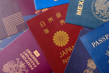 Passports of citizens of different countries of the world, background consisting of passports of several countries.の写真素材