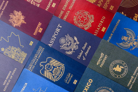 Passports of citizens of different countries of the world, background consisting of passports of several countries.の写真素材