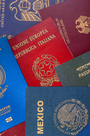 Passports of citizens of different countries of the world, background consisting of passports of several countries.の写真素材