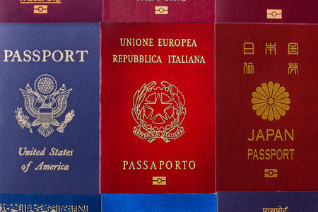 Passports of citizens of different countries of the world, background consisting of passports of several countries.の写真素材