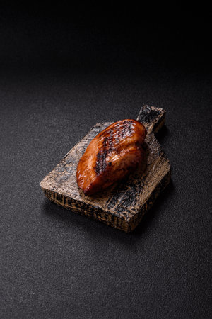 Chicken breast, grilled fillet, meat meal on a plate. Useful grilled poultry for lunchの写真素材