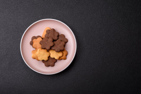 Sweet crispy biscuit with cocoa flavor, baking at home. Biscuit as a dessert for the dinner tableの写真素材