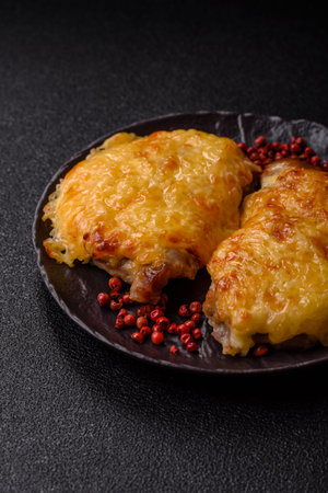 Steak, a pork or chicken chop covered with melted cheese. Grilled meat fillet for dinnerの写真素材